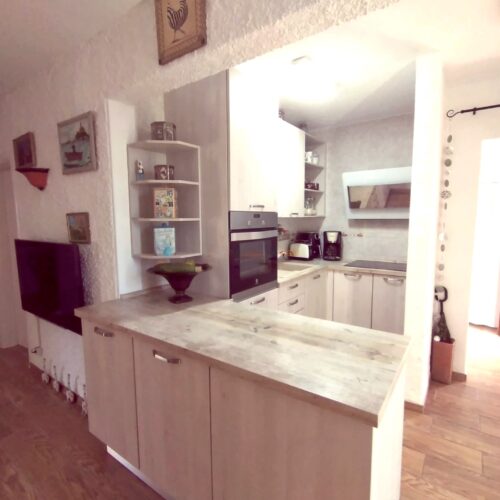 Erdgeschosswohnung mit privatem Garten & Gemeinschaftspool in Cala Mandia