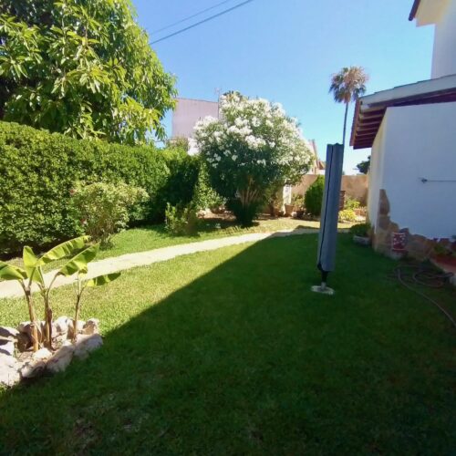 Erdgeschosswohnung mit privatem Garten & Gemeinschaftspool in Cala Mandia